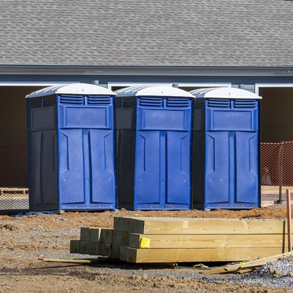 what is the cost difference between standard and deluxe porta potty rentals in Springville AL